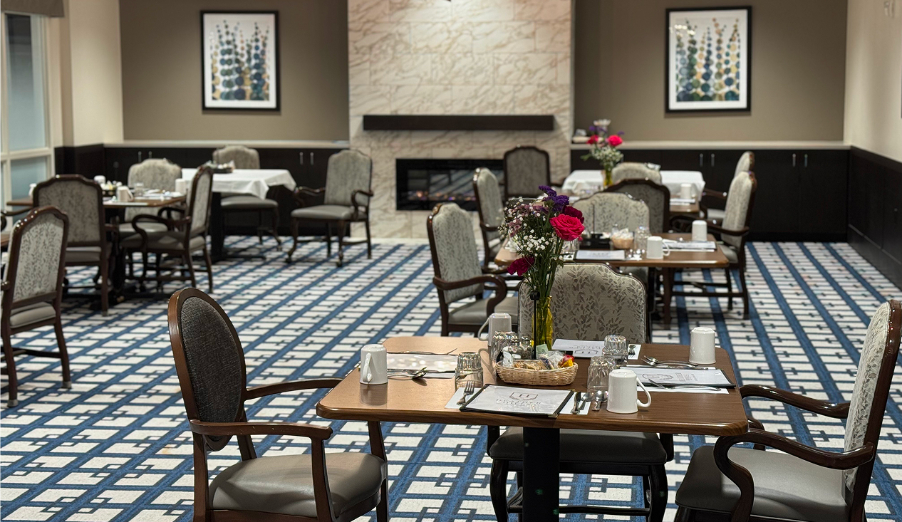A dining room featuring blue and white checkered flooring, creating a cheerful and inviting atmosphere.